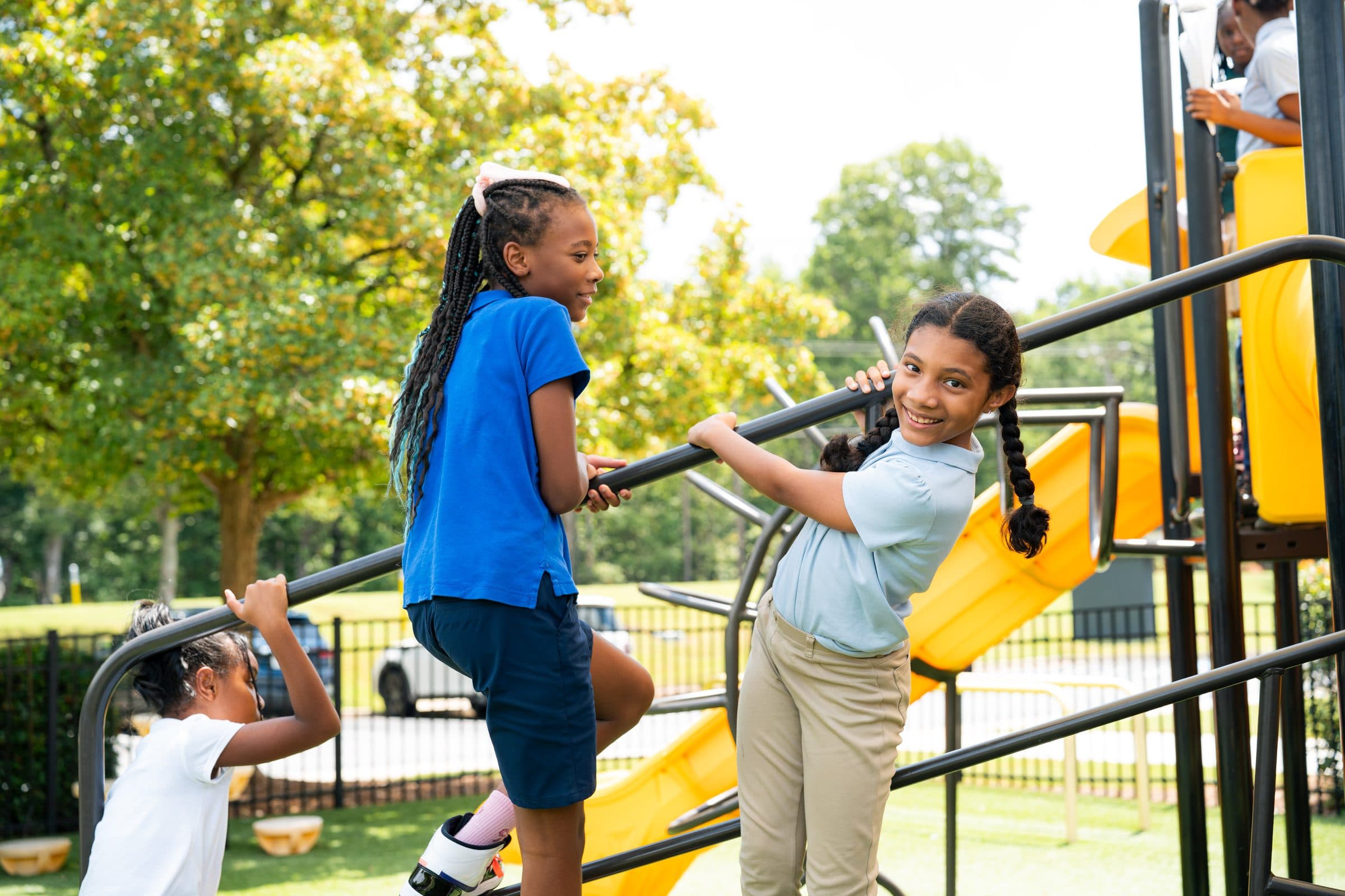 Students smiling on the playground at Chapel Hill Christian School
